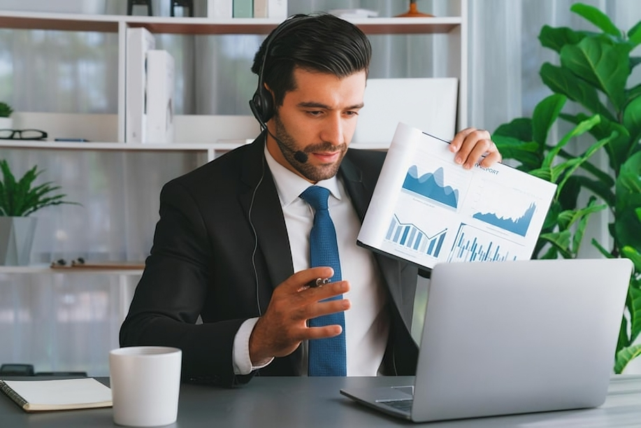 68e77ba3bc88c486289745d1 man with headset his head talks laptop 31965 177491